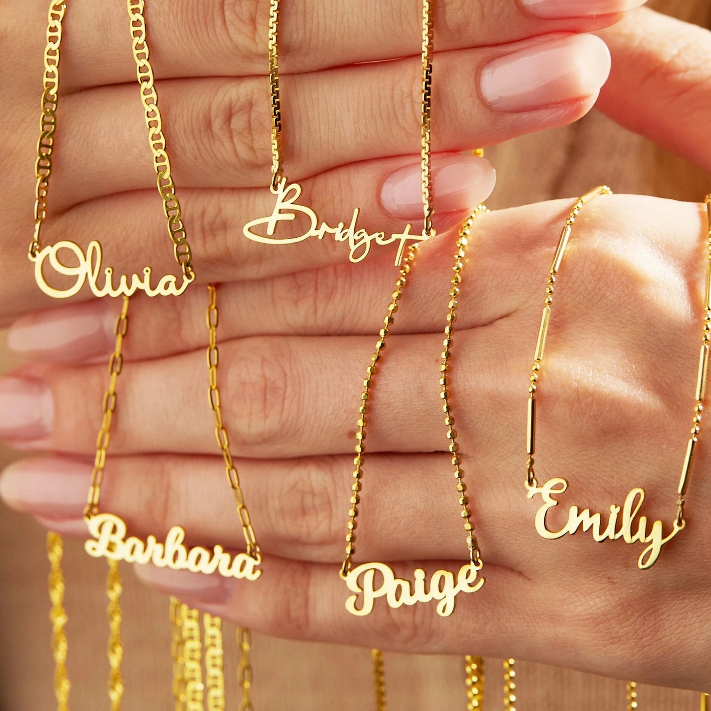 Custom name pendant necklace in 14k gold plate on sterling silver chain close-up