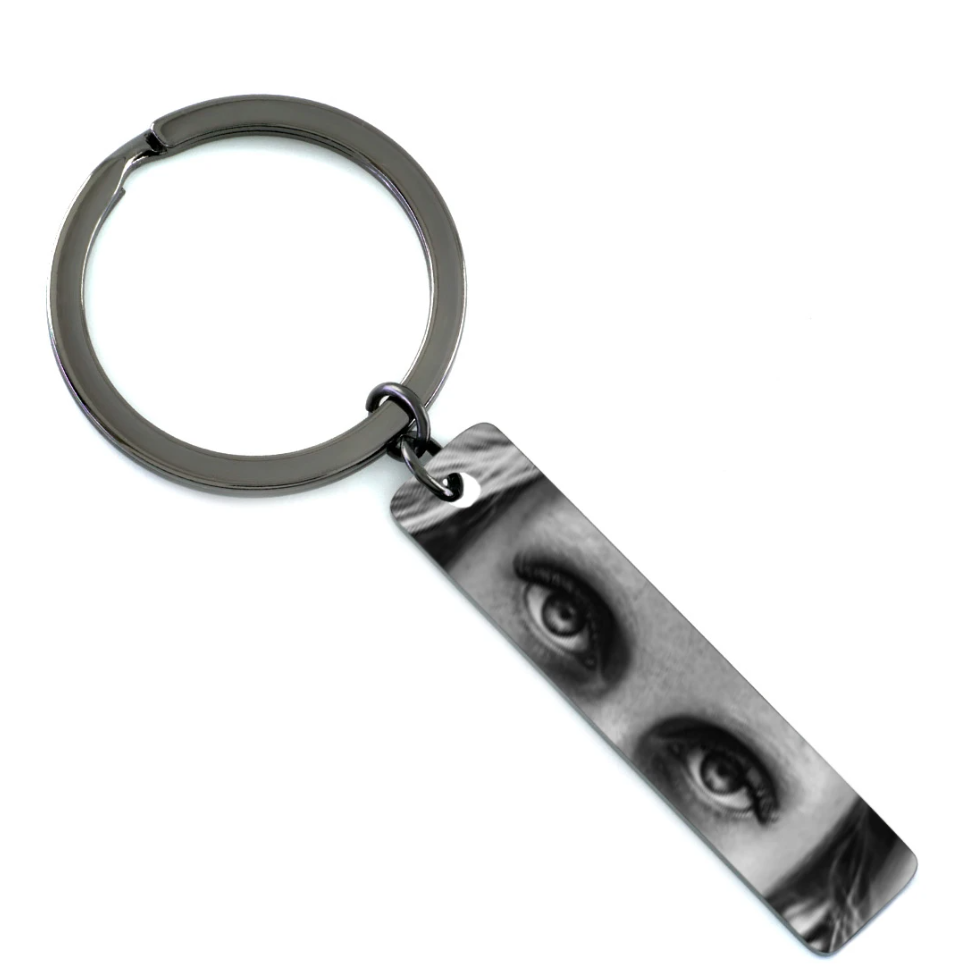 Personalized eye jewelry keychain in stainless steel ring close-up