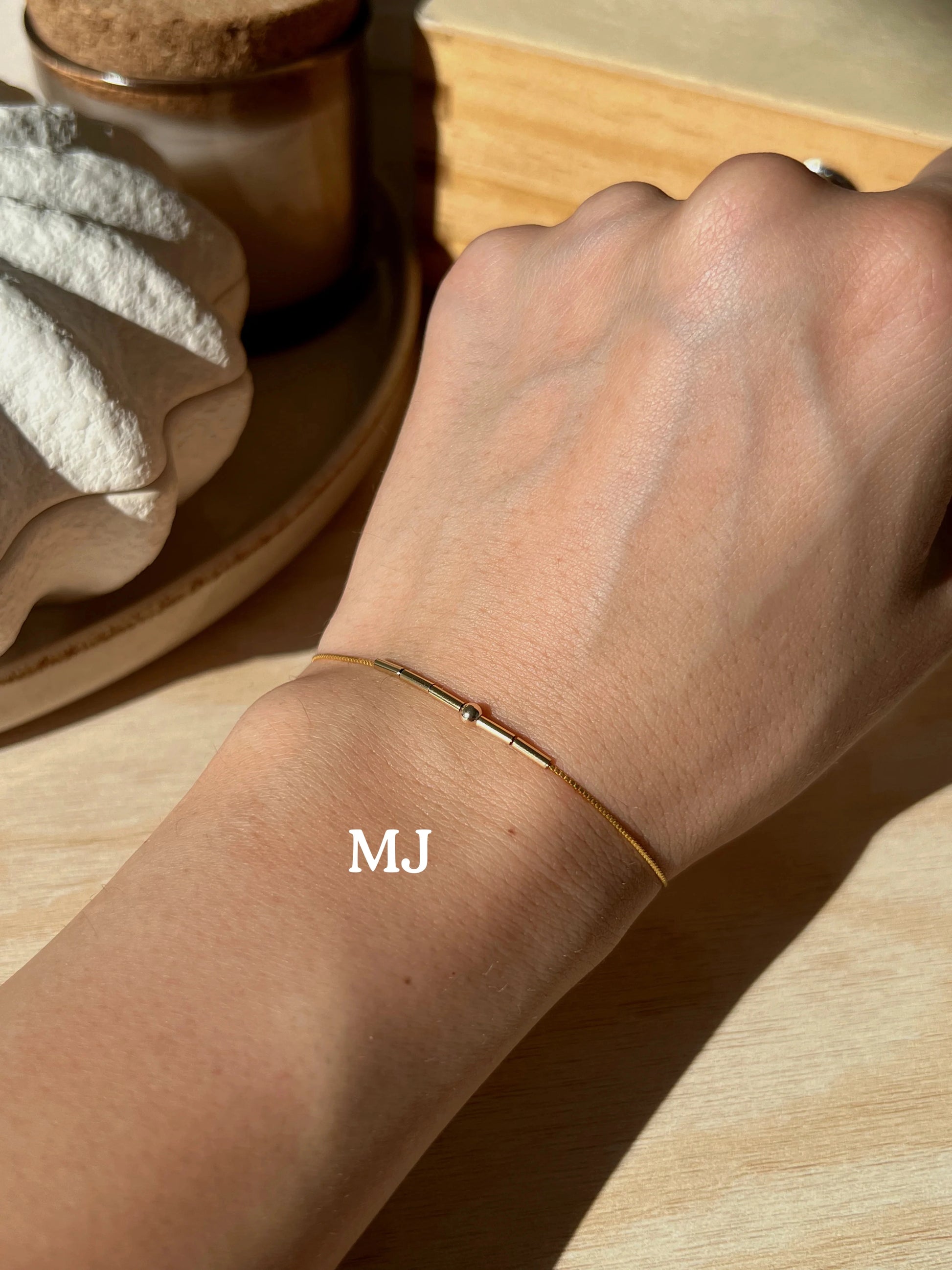Personalized morse code jewelry bracelet in stainless steel beads close-up