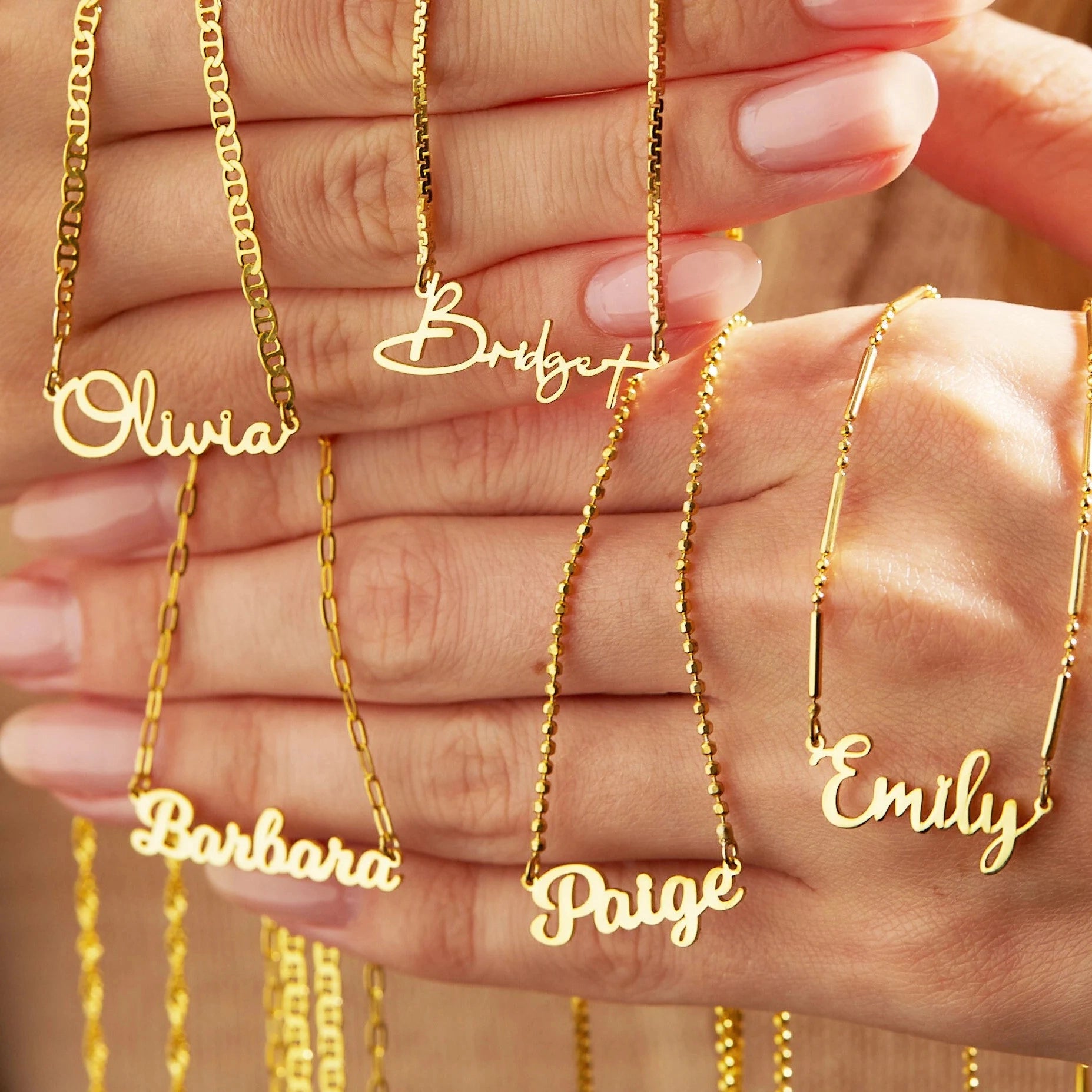 Custom name pendant necklace in 14k gold plate on sterling silver chain close-up